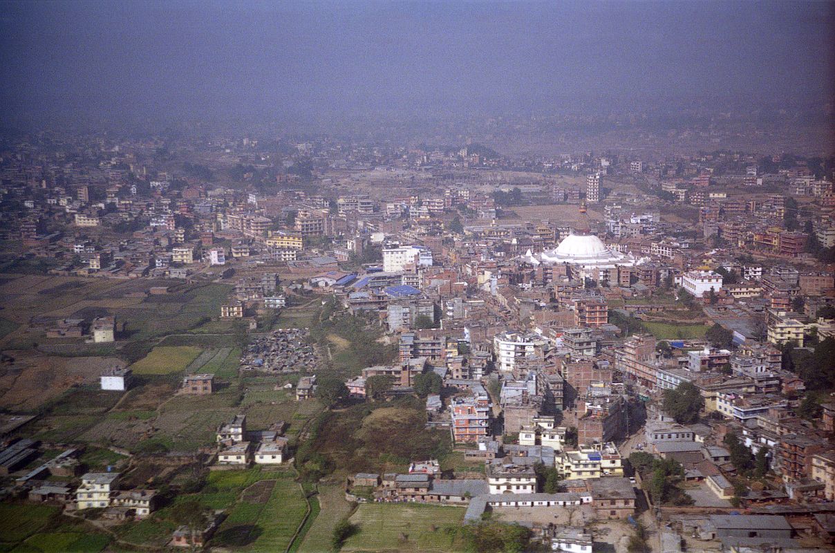 Kathmandu Boudhanath 01 Boudhanath View From Airplane Just after taking off from Tribhuvan Airport in Kathmandu, we flew over Boudhanath with an expansive view of the surrounding area near Kathmandu.